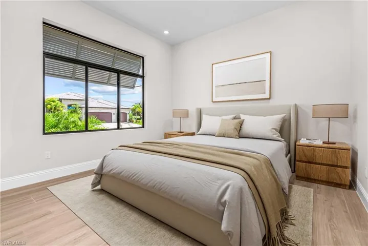 Bedroom featuring light wood finished floors and recessed lighting