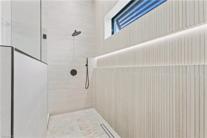 Bathroom with tiled shower