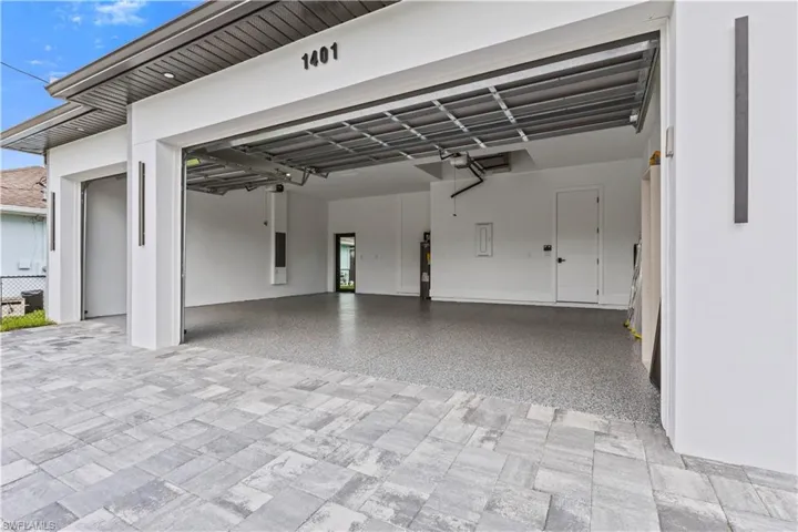 Garage with decorative driveway