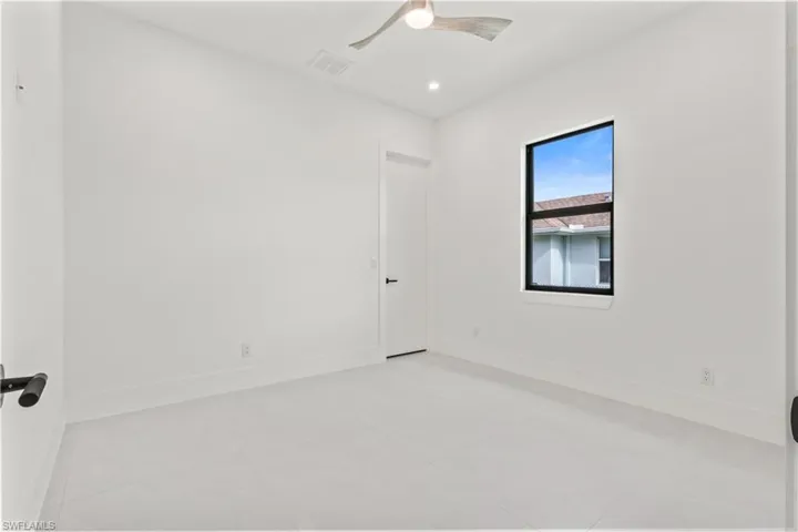 Spare room with recessed lighting, a ceiling fan, and light tile patterned floors