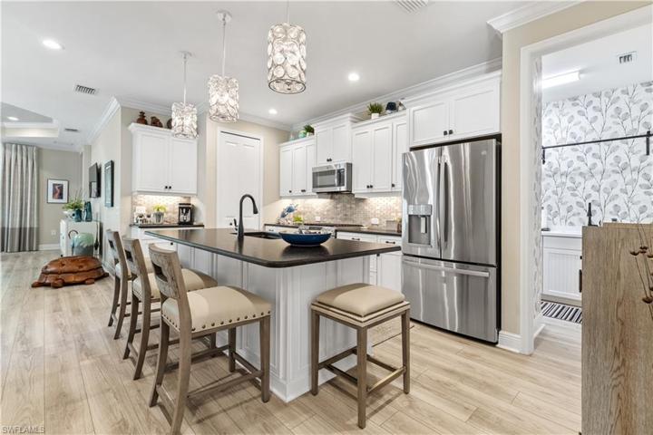 Upgraded Kitchen with wood cabinets, crown molding