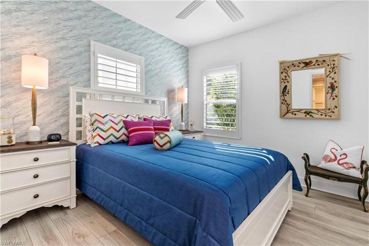 Guest bedroom with wood plantation shutters