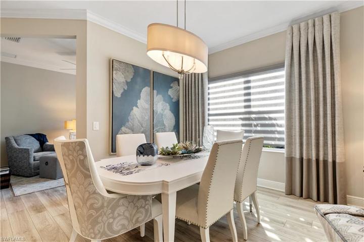 Perfect dining area with designer light fixture