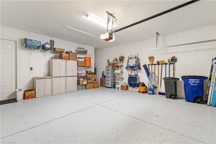 Two car garage with epoxy floor.