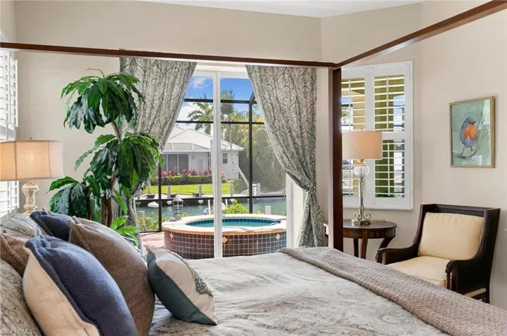 Bedroom with a water view