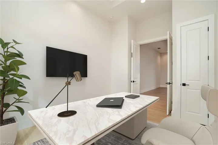 Home office or 4th bedroom featuring light wood plank tile floors