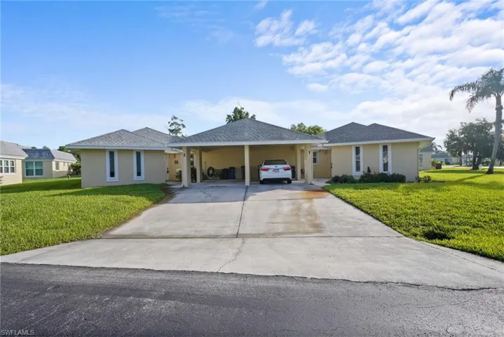 2 Greens Cir, Lehigh Acres, Florida 33936
