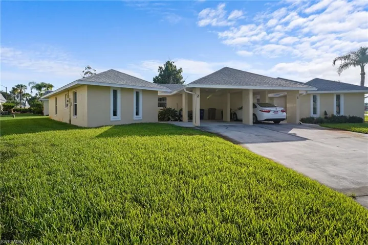 2 Greens Cir, Lehigh Acres, Florida 33936