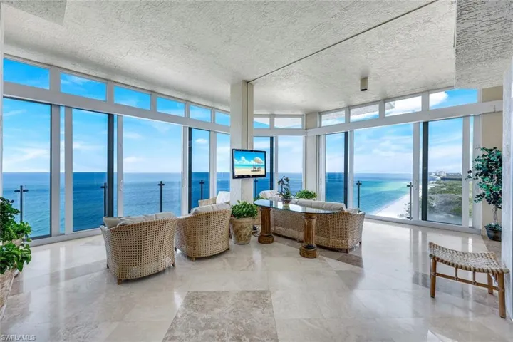 Enclosed balcony with automated electric shutter doors