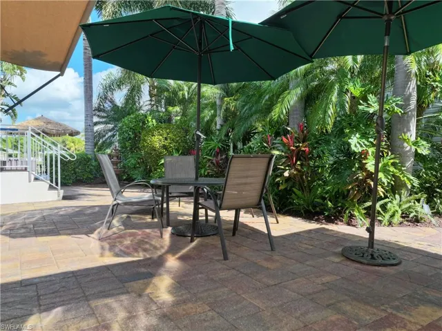 View of patio featuring outdoor dining area