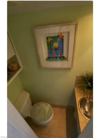 Bathroom featuring vanity and tile patterned floors