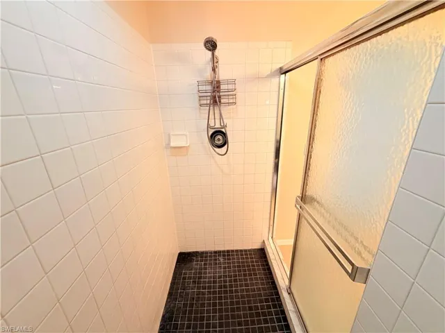 Bathroom with a stall shower