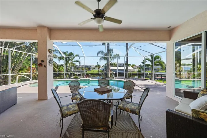 Covered back patio overlooking canal