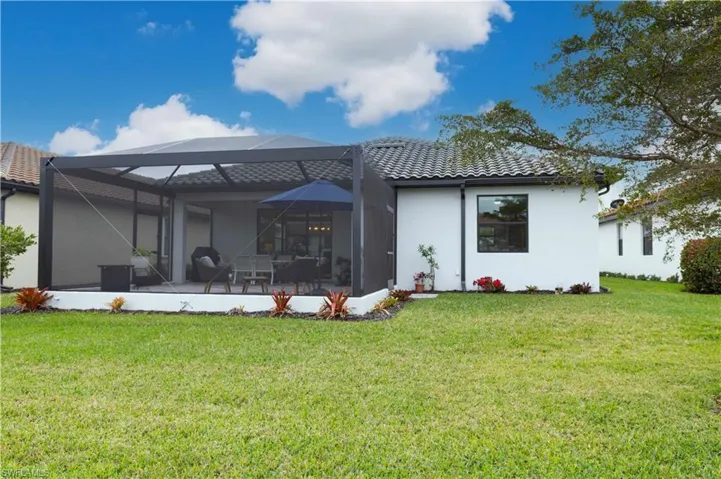 Custom built extended lanai w/unique drainage system