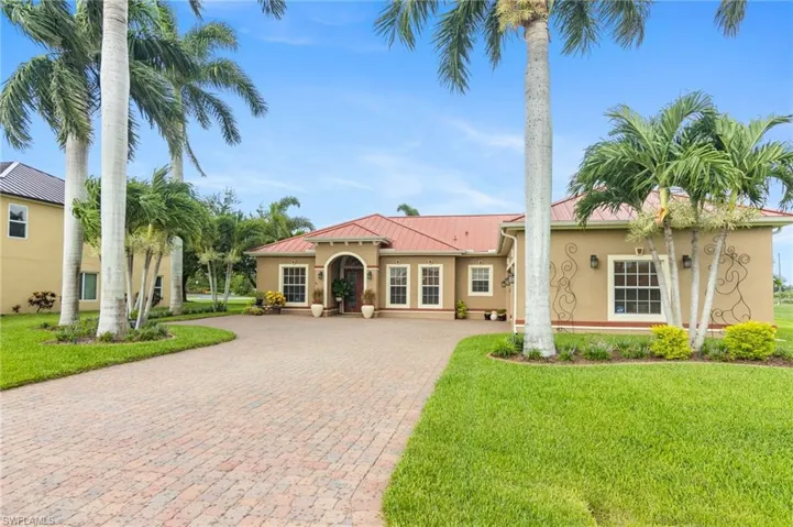 View of front of property with a front yard