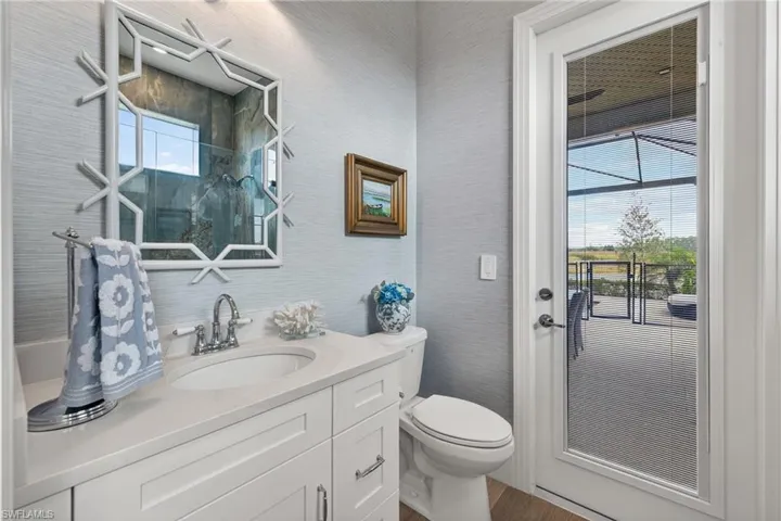 Bathroom with vanity and dark wood finished floors