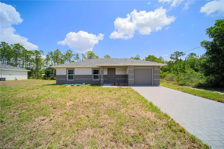 Amazing New Construction 3 Bedroom/2 Bathroom Home On An Oversized .40 Acre Lot In The Greenbriar Neighborhood In Lehigh Acres!