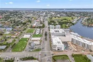 View of property location with a nearby body of water
