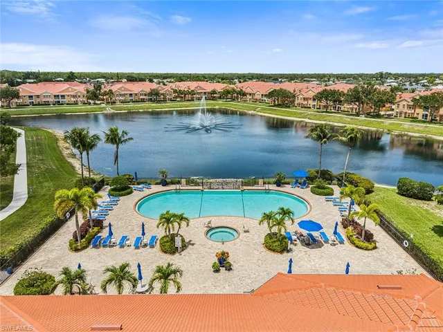 View of swimming pool featuring a water view and a residential view