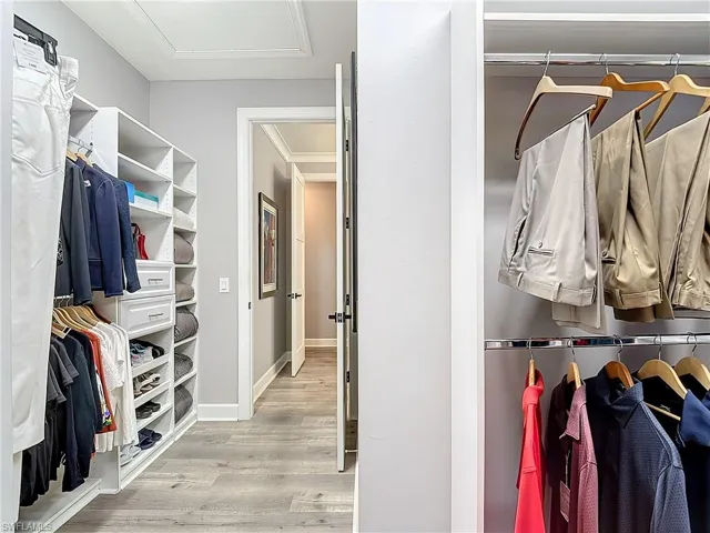 Walk in closet featuring light hardwood / wood-style floors