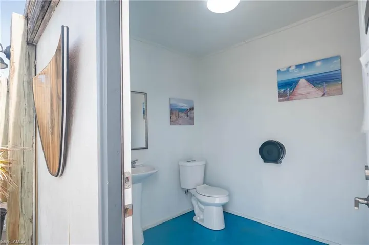 Bathroom with sink and toilet