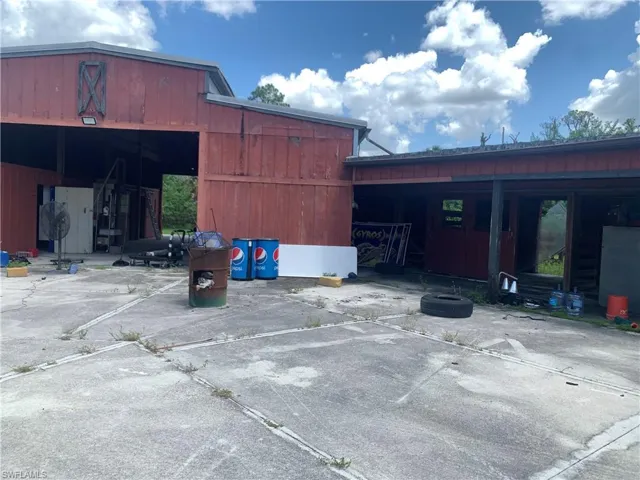 View of stable with 7 horse stalls.