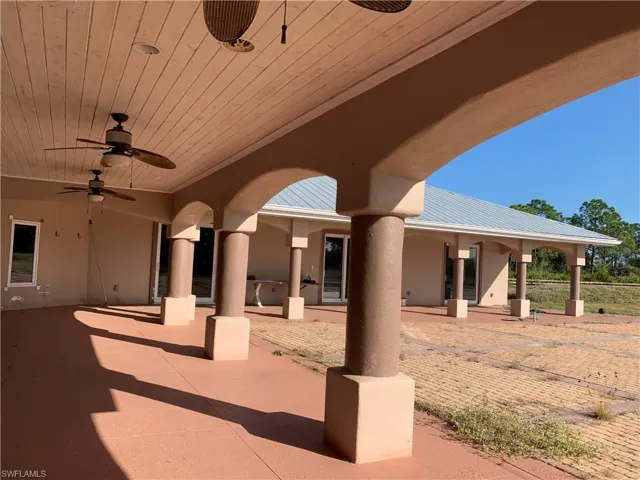 View of patio / terrace featuring a ceiling fan