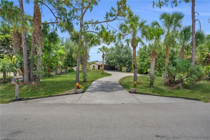 View of front of house with a front yard