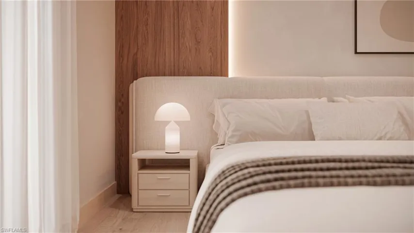 Bedroom featuring baseboards and light wood-style floors