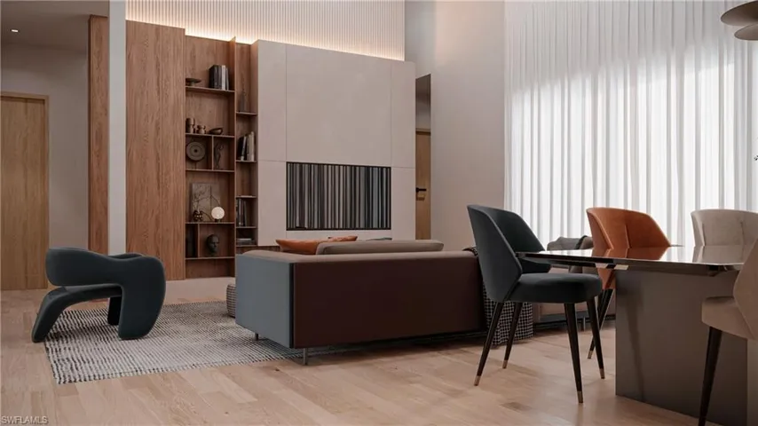 Living room with light wood-style flooring