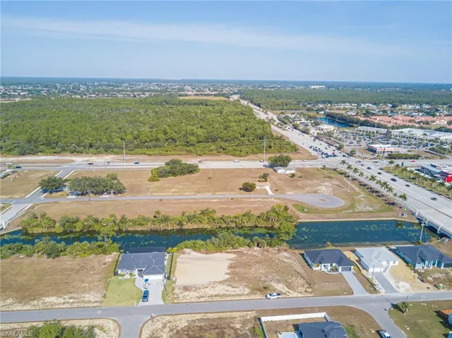 View of property location with a nearby body of water