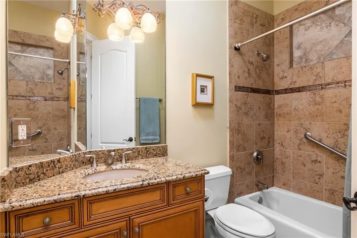 Guest bathroom, granite countertop, tub and shower