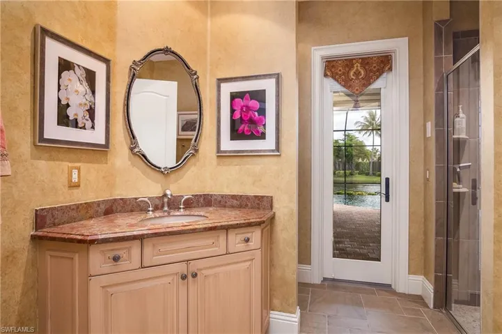 Convenient pool full bath and powder room for guests. Granite counter and shower.
