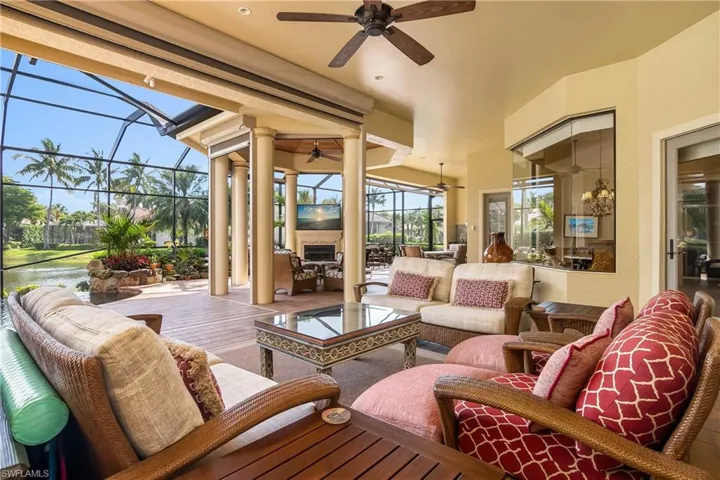 Lanai functions as its own living area, really a 'second' house, with outdoor kitchen, refrigerator, wet sink, and natural gas grill. Relax while watching TV in front of a natural gas fireplace. All hurricane screen protected!