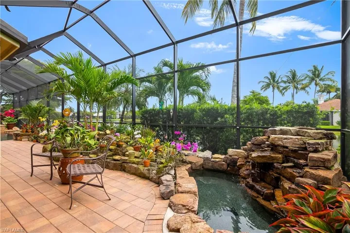 Lanai waterfall with over 60 Orchid plants in bloom. Magnificent.