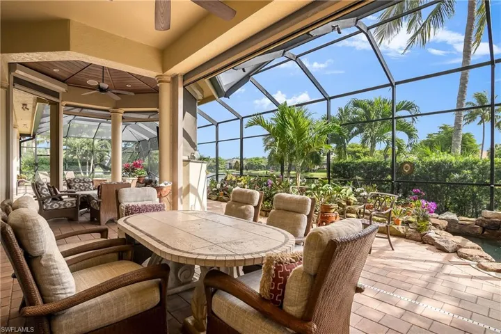Lanai dining area adjacent to Orchid garden and rock waterfall