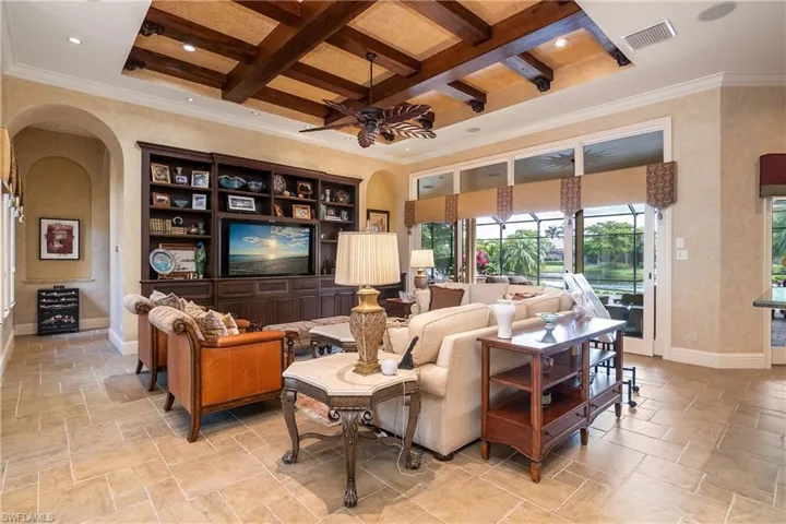 Expansive great room, hallway leading to bedrooms