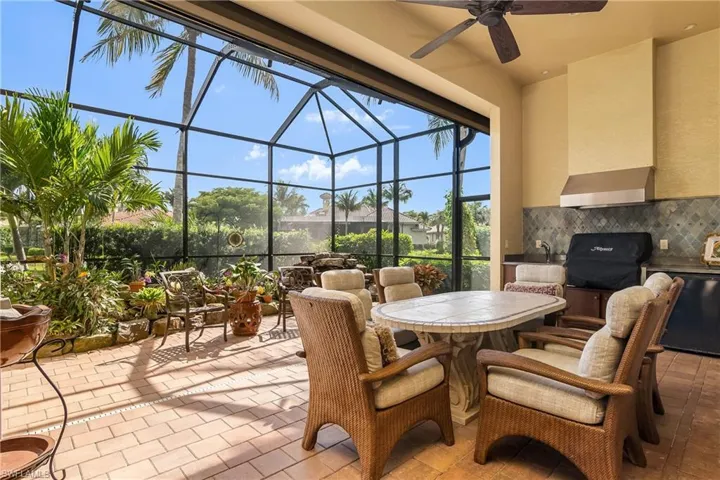 Gas grill, hood, refrigerator, wet sink summer kitchen. Private and quiet setting.