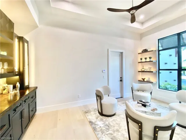 Cocktails, Cards & Conversation Room has built-in cabinetry and two Sub Zero Refrigerator Drawers.