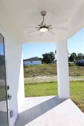 View of patio with a ceiling fan