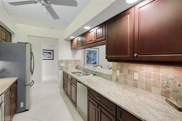 GRANITE, WOOD CABINETRY
