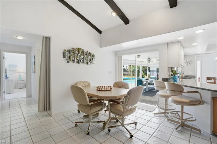 Dinette area for casual dining with pocket sliding doors opening to the lanai.
