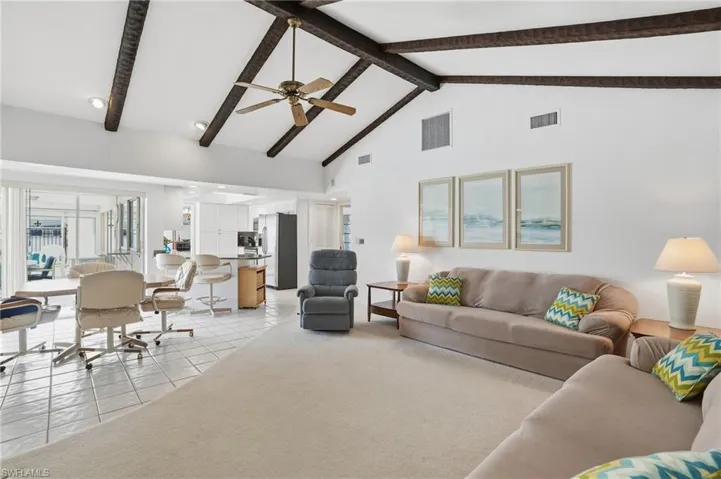 Spacious family room opens up to Kitchen and dinette area.