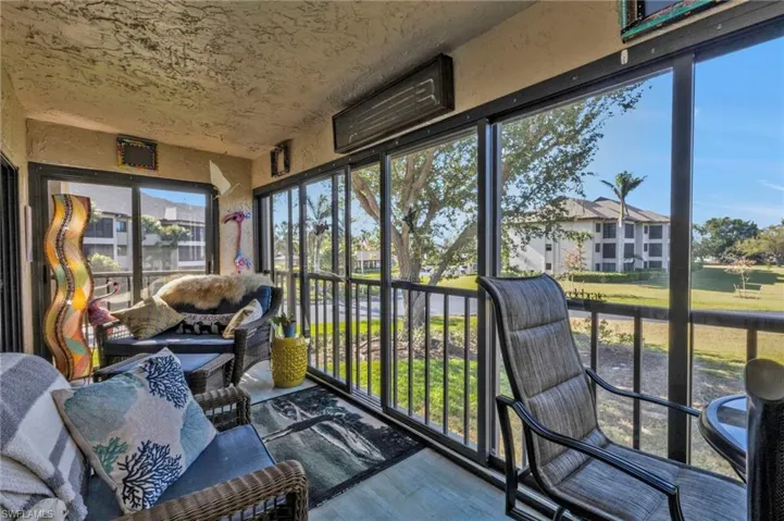 Sunroom / solarium with a wealth of natural light