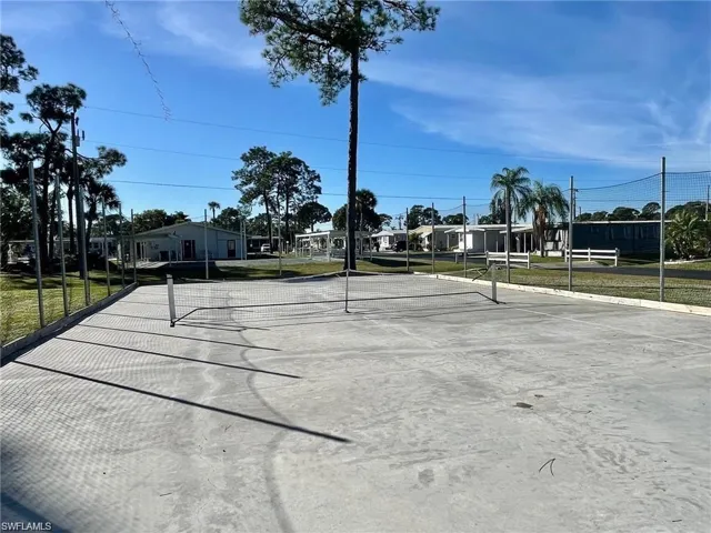 View of concrete driveway with a residential view