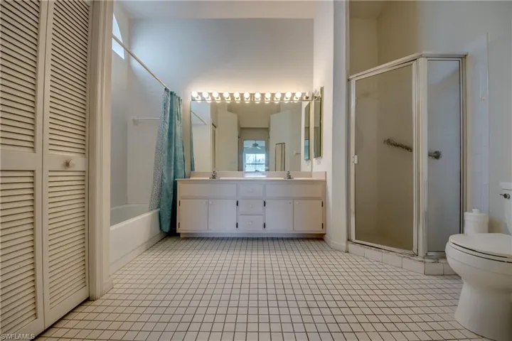 Master Bath with separate tub + shower + dual vanity.  Ample linen closet and 2 walk-in closets.