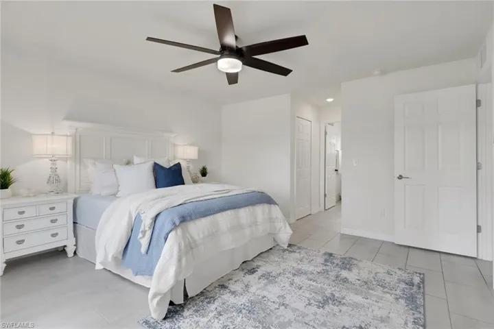 Master bedroom featuring,dual walk-in closets,