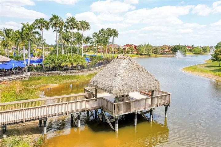 Dock area featuring a water view