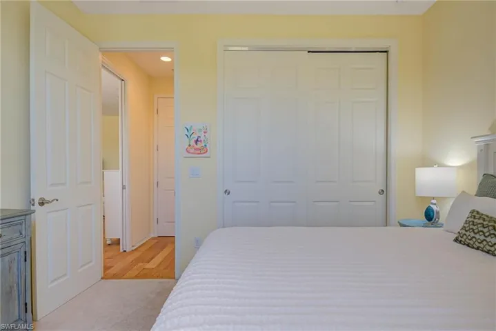 Bedroom featuring a closet and wood finished floors