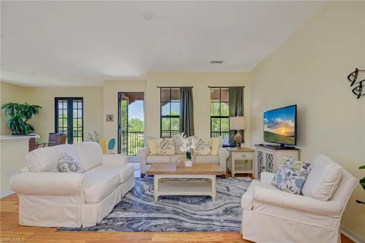 Living room featuring wood finished floors and french doors